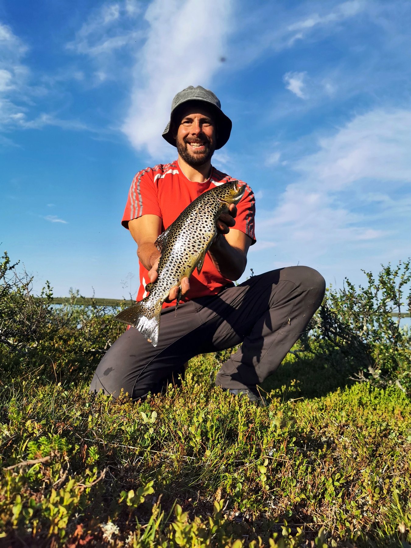 Summer brown trout caught in golden light